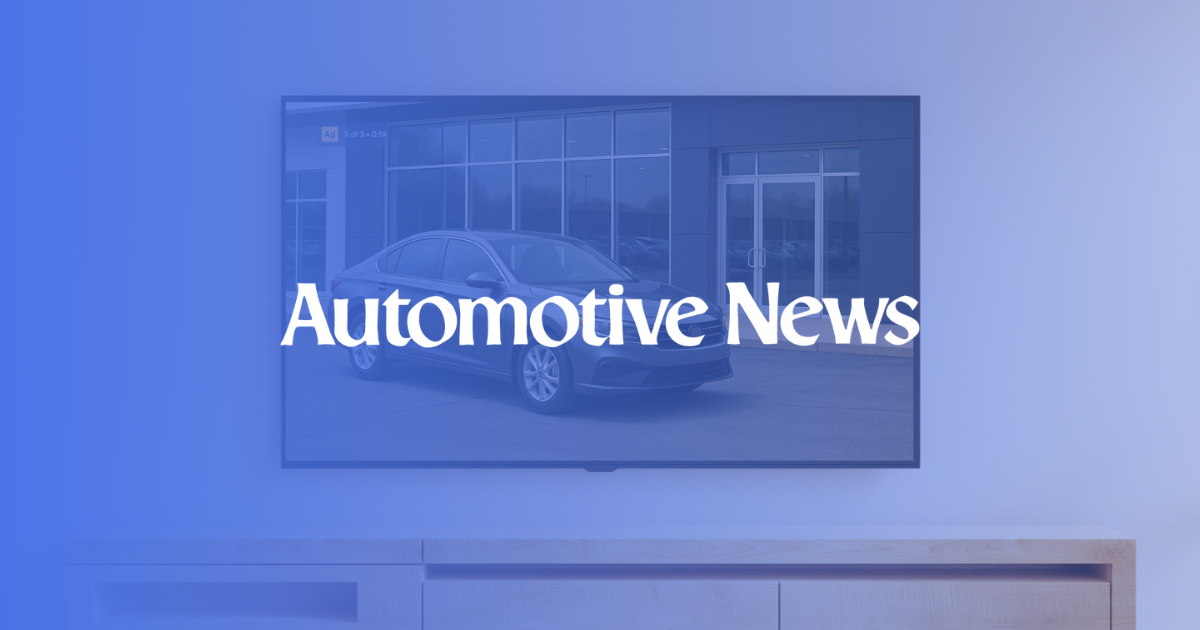 ASC logo overlayed on an image of a car advertisement on a tv in a living room